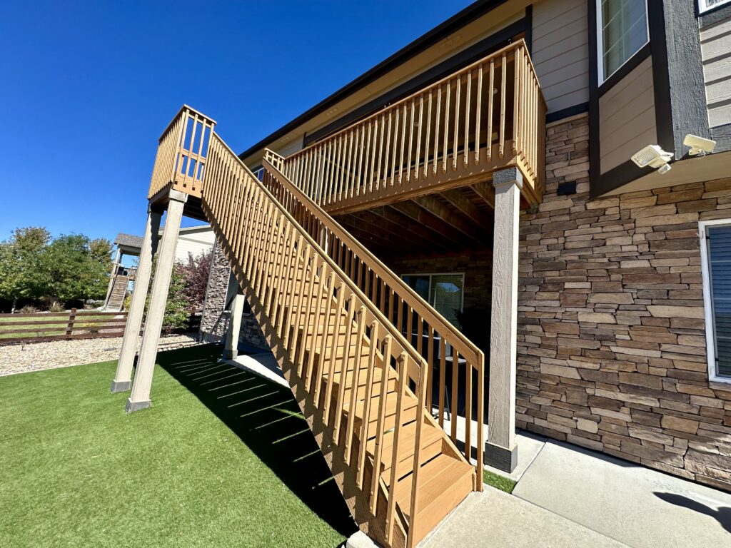 A deck professionally treated with colored stain